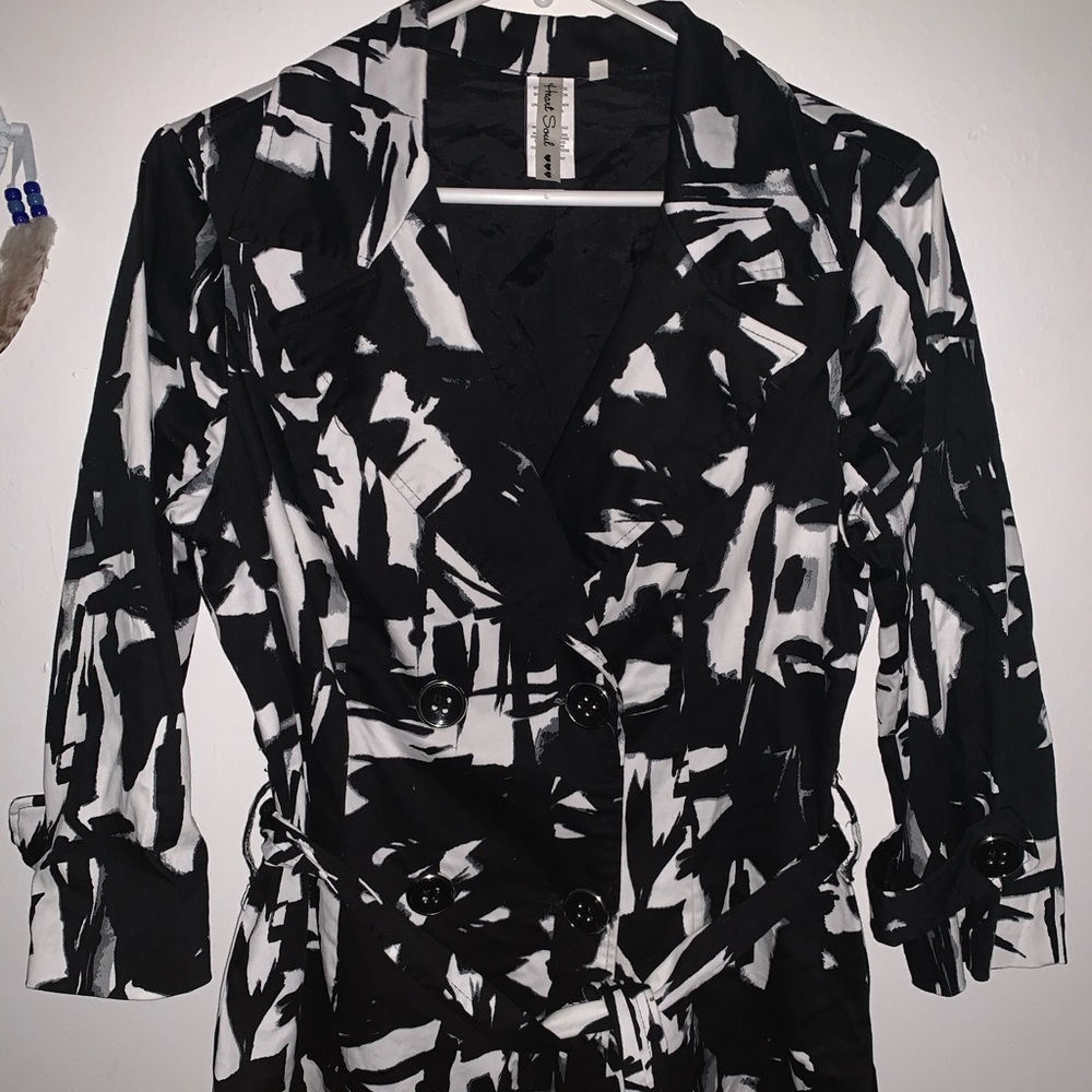 A black and white trench coat.